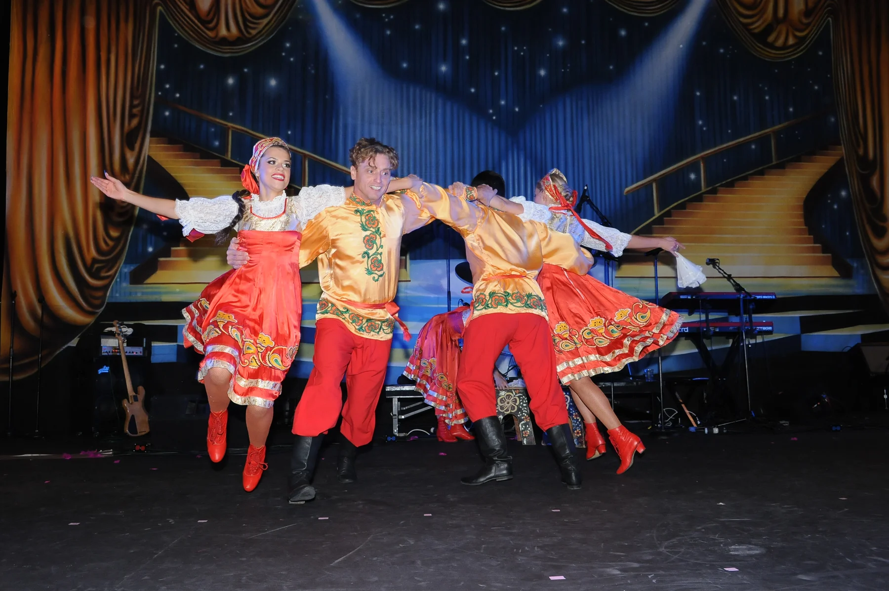 Colorfully costumed performers on a Las Vegas stage